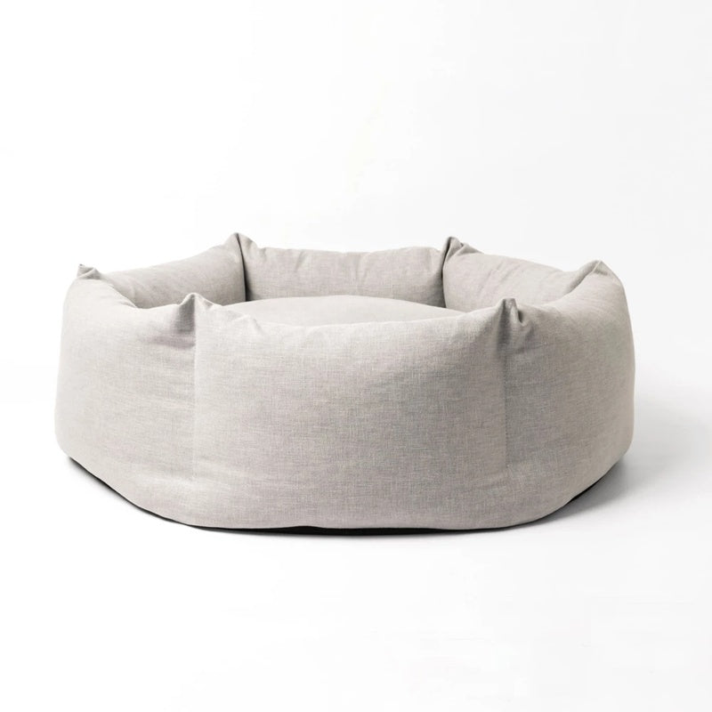 Cama para perros con forma de donut de tela suave y cómoda