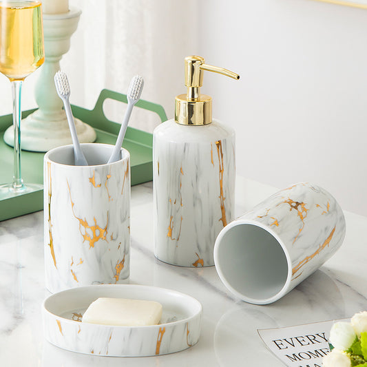 Kit de baño de cerámica con acabado en mármol blanco y dorado