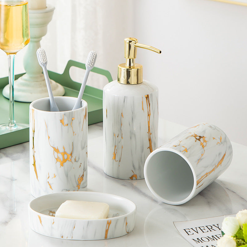 Kit de baño de cerámica con acabado en mármol blanco y dorado